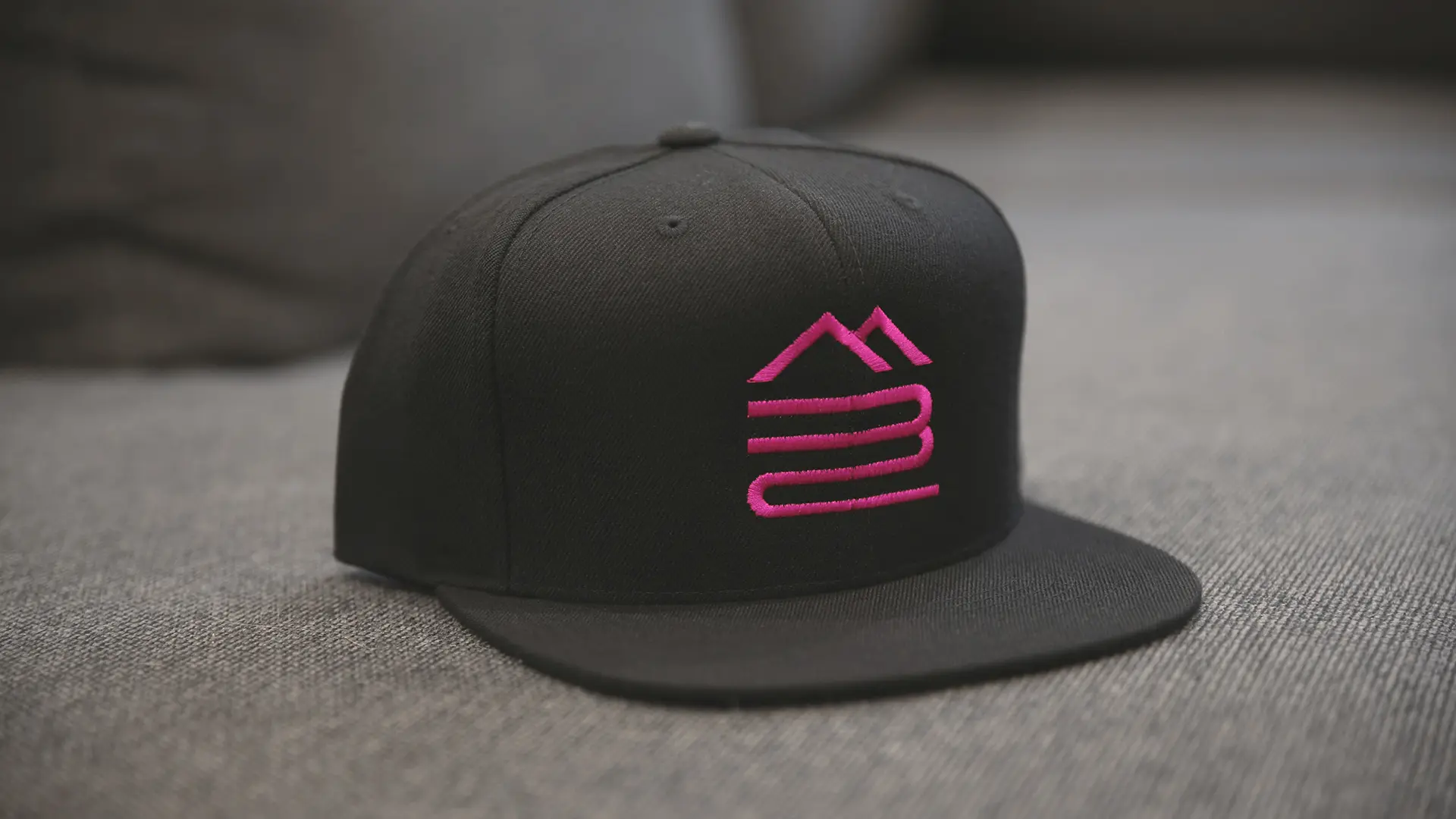 curious-humans-brand-identity-design-merchandise-cap-mountain-bike-catalogue